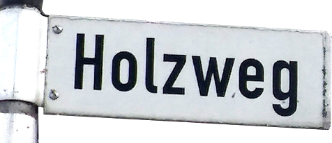 Straßenschild: "Holzweg"